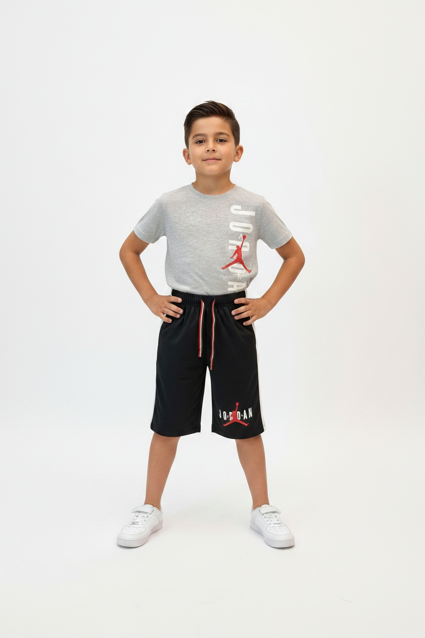 Boy wearing Jordan Grey & Black Set