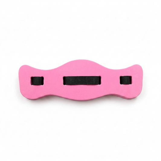 Child wearing pink foam swim belt at pool for buoyancy and water safety training