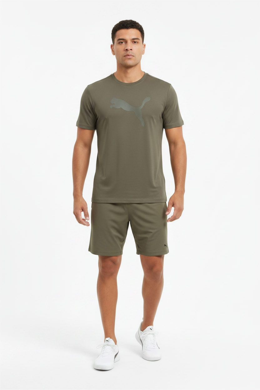 Adult wearing Puma t-shirt