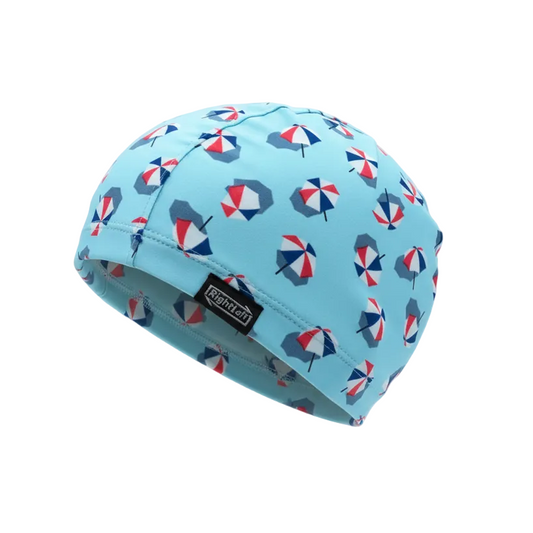 Beach umbrella patterned lycra cap - left side floating view