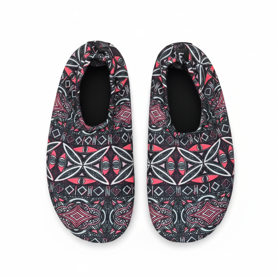 Black pink tribal geometric pattern water shoes on white background