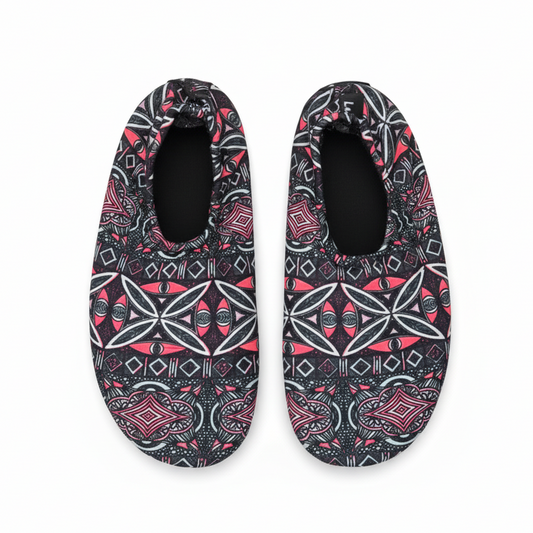 Black pink tribal geometric pattern water shoes on white background