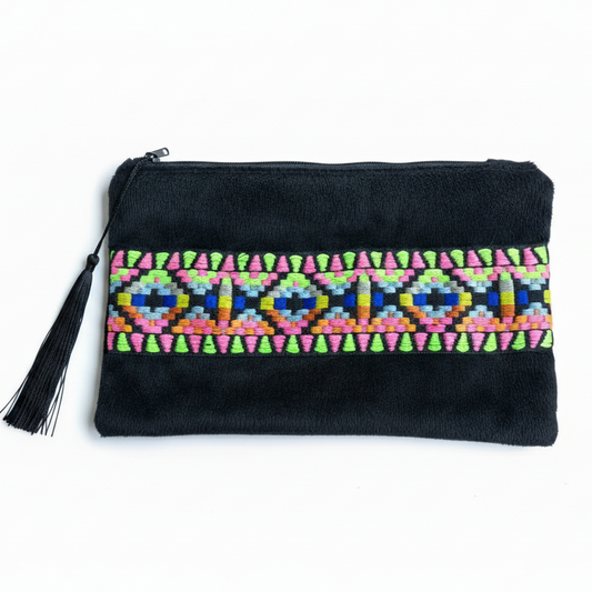 Black pouch with geometric embroidery on white background