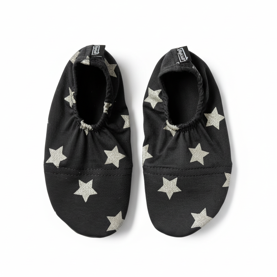 Black shoes with white stars on white background