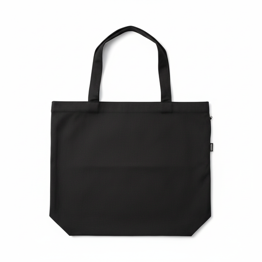 Black tote bag with side pocket on professional white background