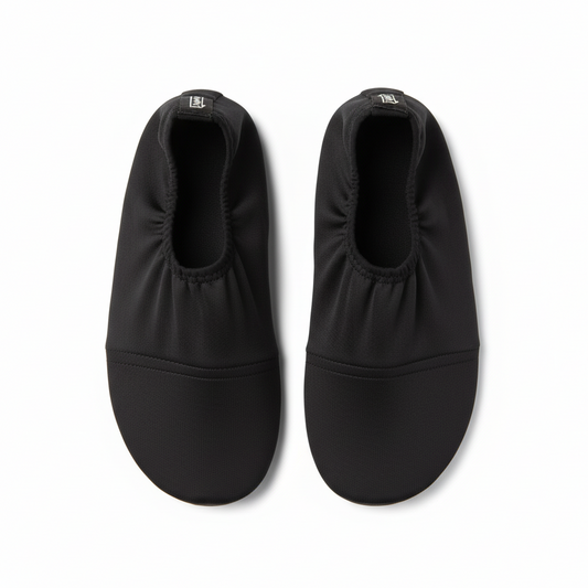 Black water shoes on white background