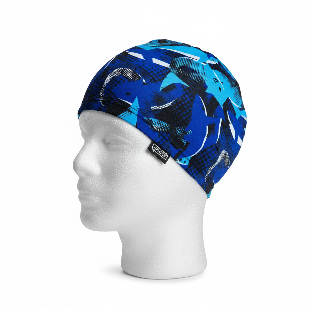 Blue shark patterned lycra cap on mannequin - left side view with brand