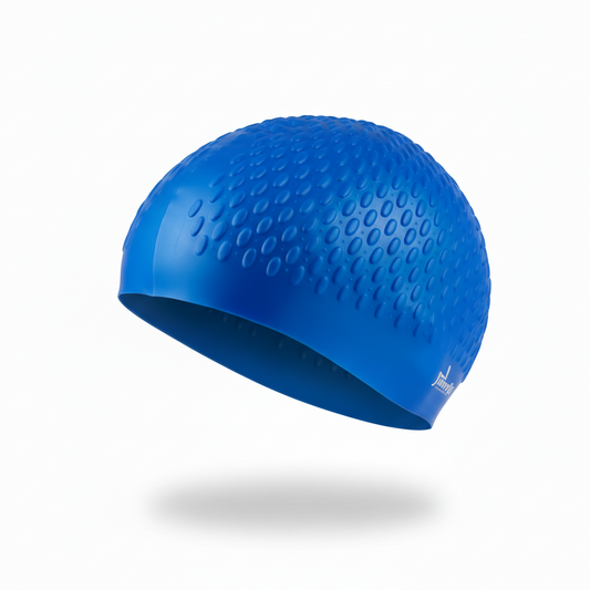 Blue silicone swimming cap floating left side view with brand