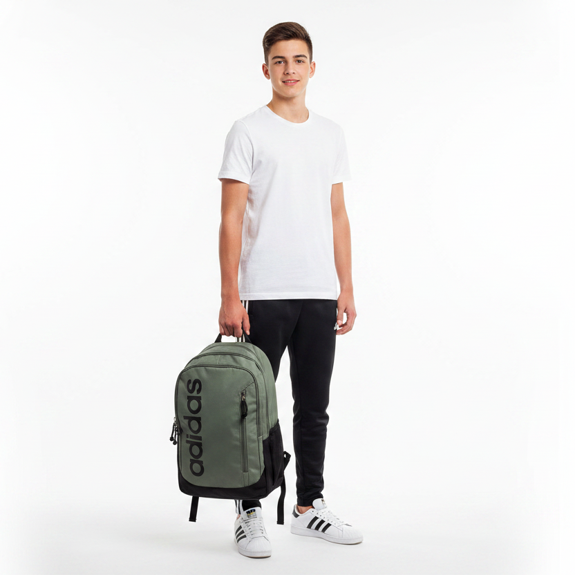 Boy holding Adidas backpack