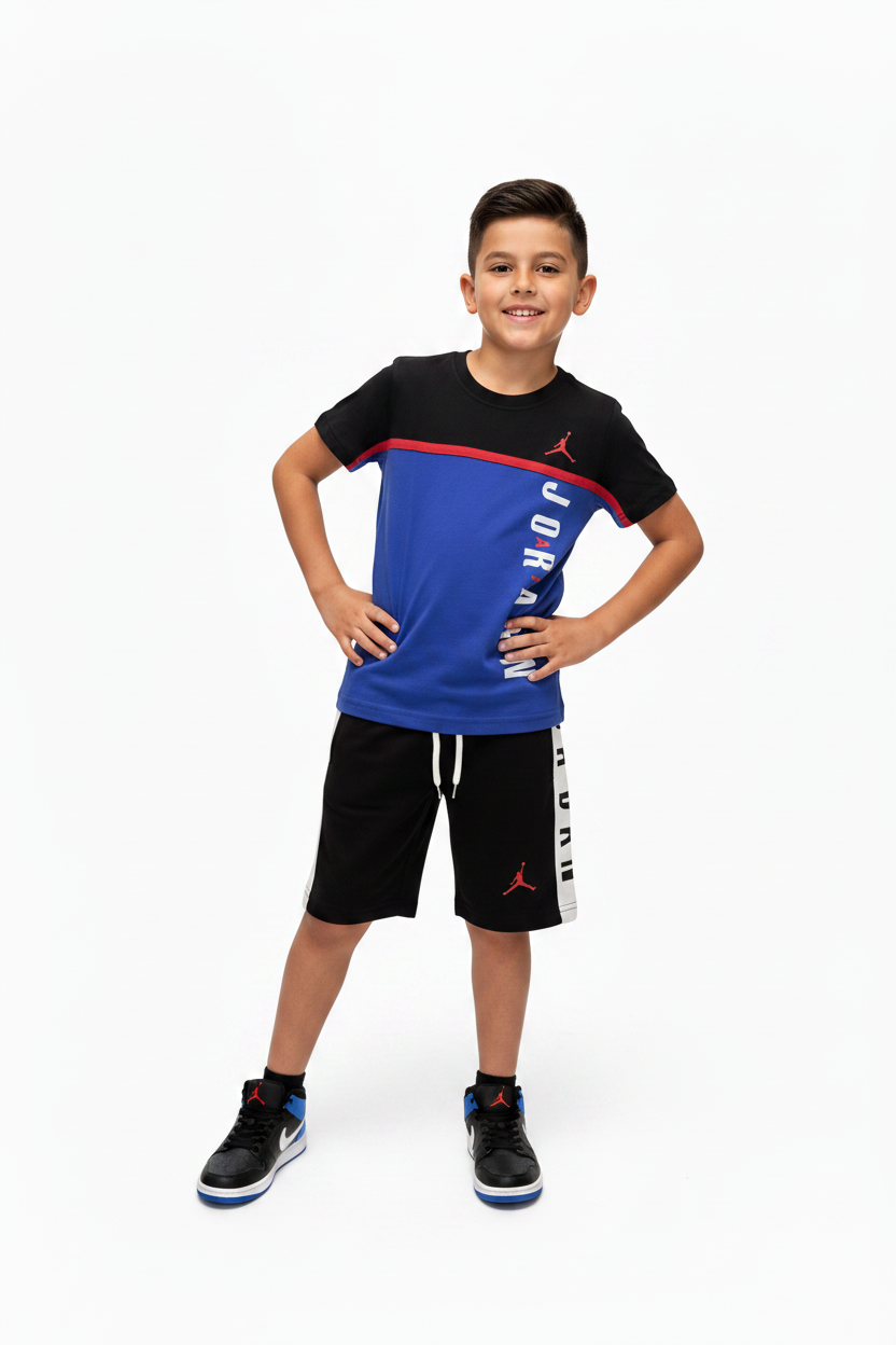 Boy wearing Jordan Blue & Black Set