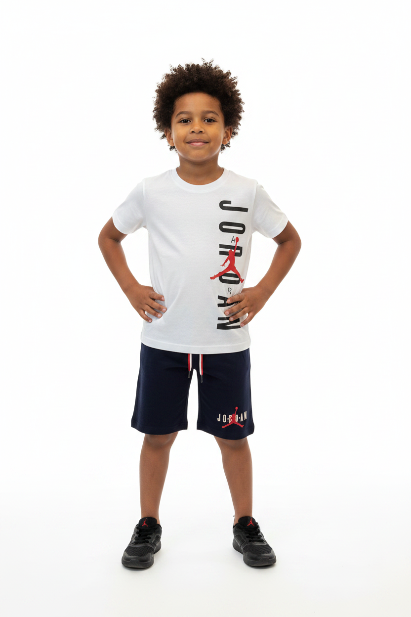 Boy wearing Jordan White & Navy Set