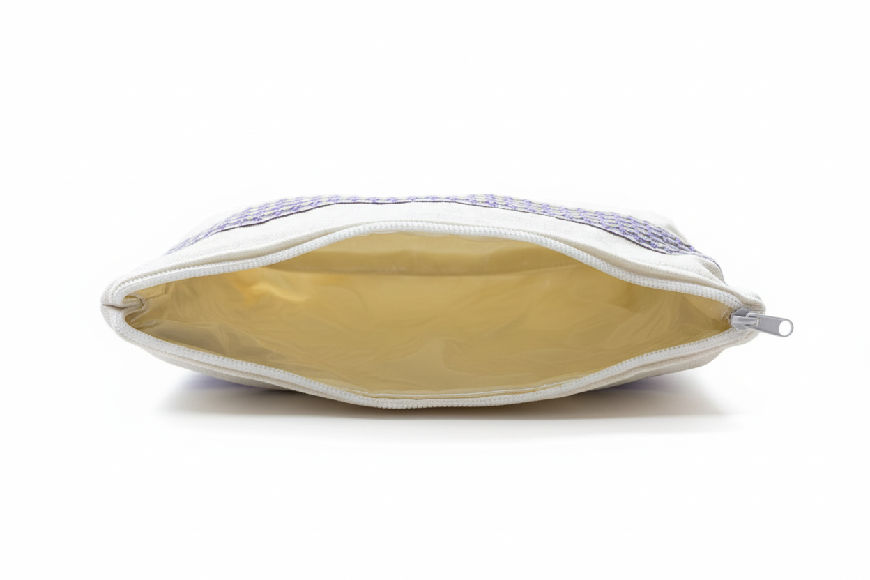 Canvas pouch with open zipper on white background