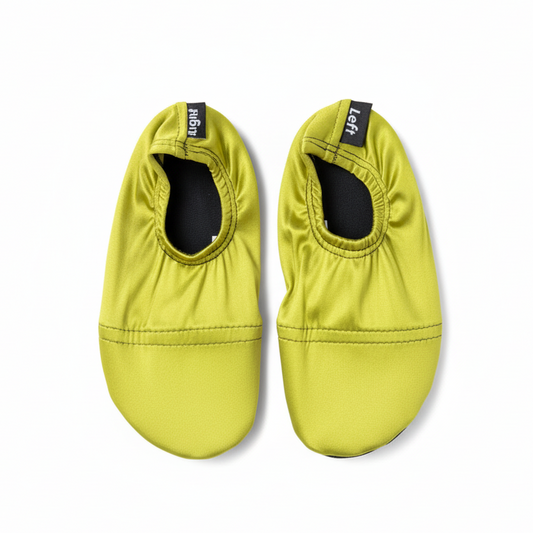 Chartreuse yellow-green water shoes on white background