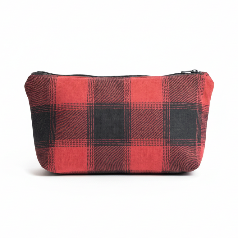 Coral pink and charcoal gray buffalo plaid clutch pouch on white background