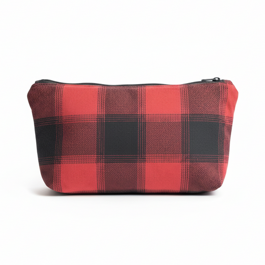 Coral pink and charcoal gray buffalo plaid clutch pouch on white background
