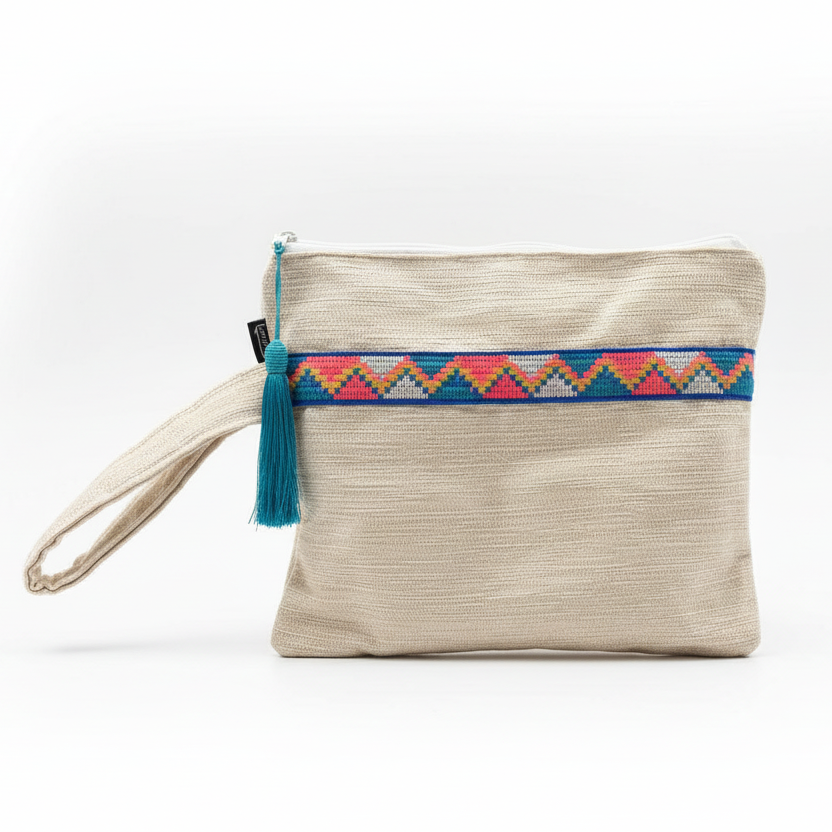 Cream beige woven wristlet clutch with geometric embroidered trim on white background