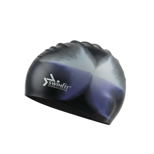 Dark blue and white patterned swim cap floating - left side view