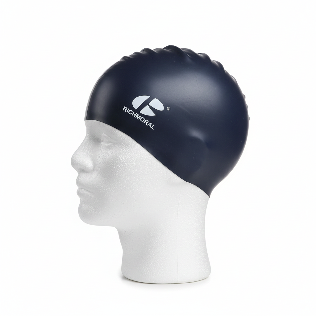 Dark blue RICHMORAL swim cap on mannequin - left side view