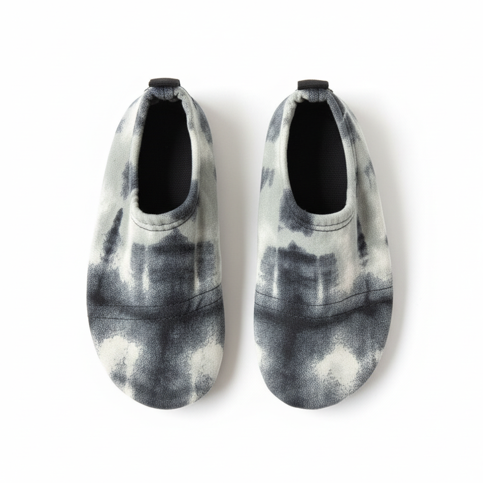 Gray and white tie-dye shoes on white background
