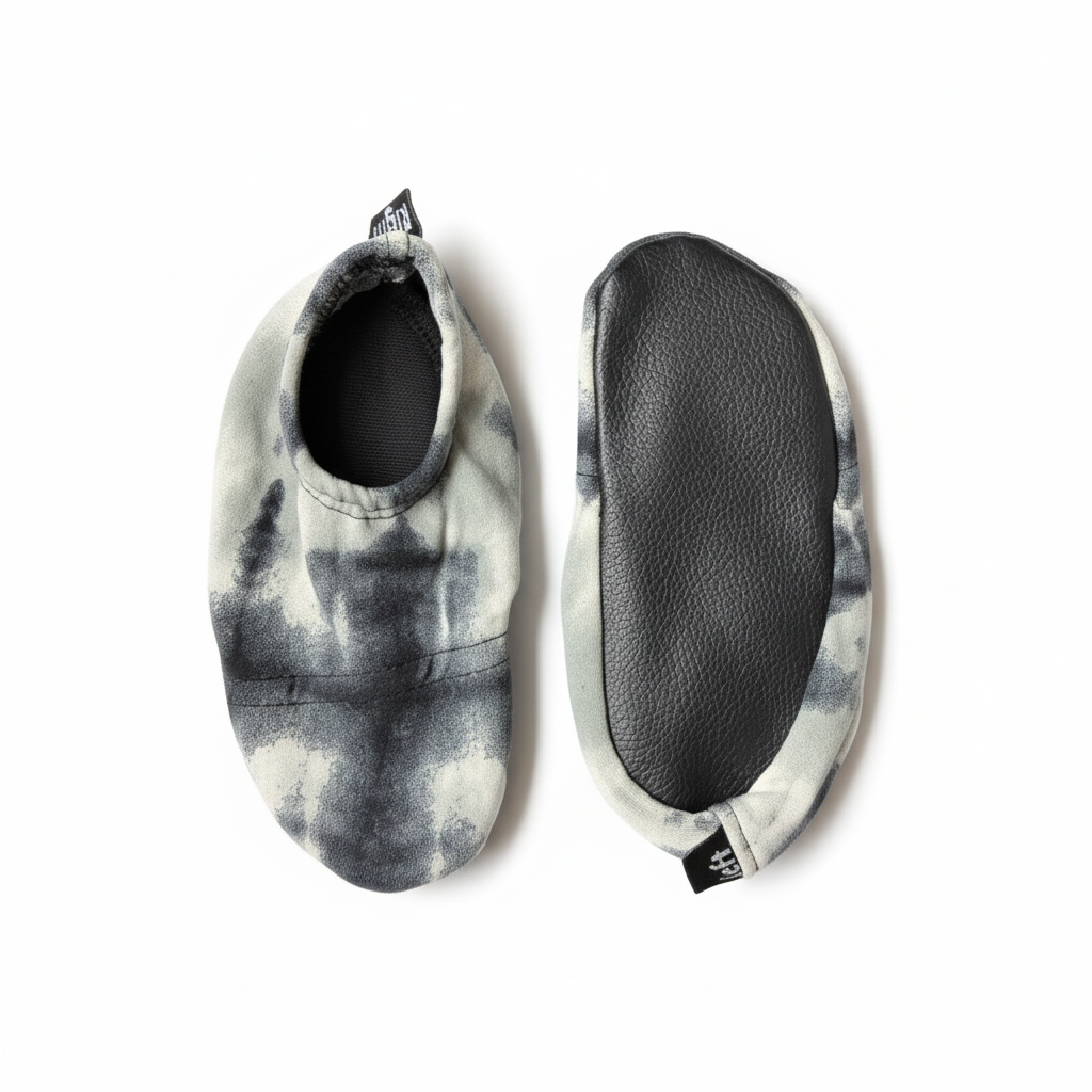 Gray and white tie-dye shoes with sole view on white background