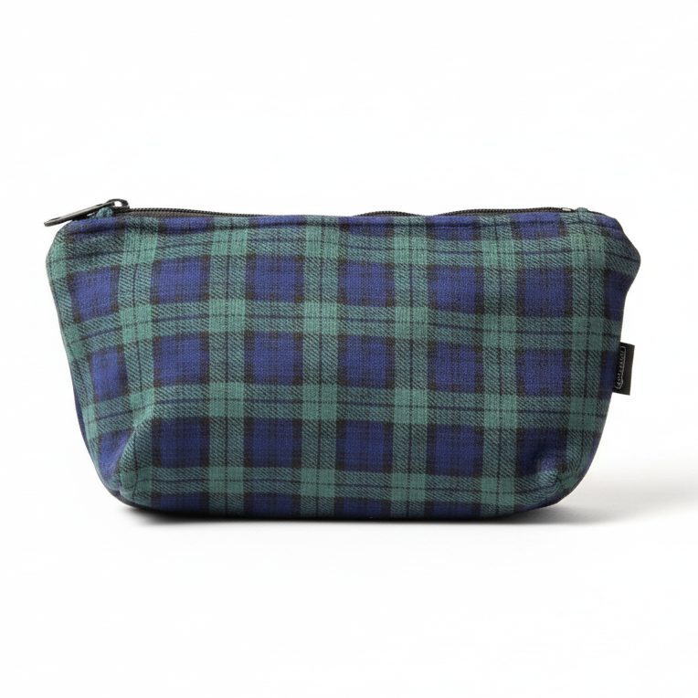 Green and purple plaid clutch pouch with black zipper on white background