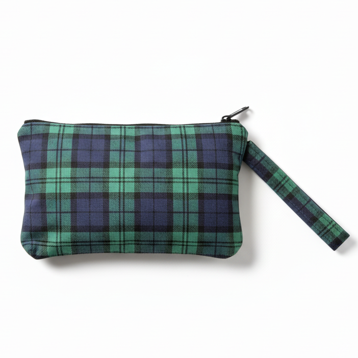 Green and purple plaid wristlet clutch on white background
