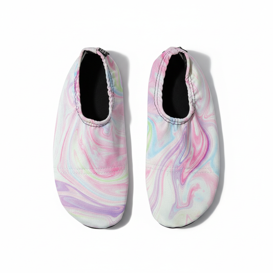 Iridescent holographic water shoes on white background