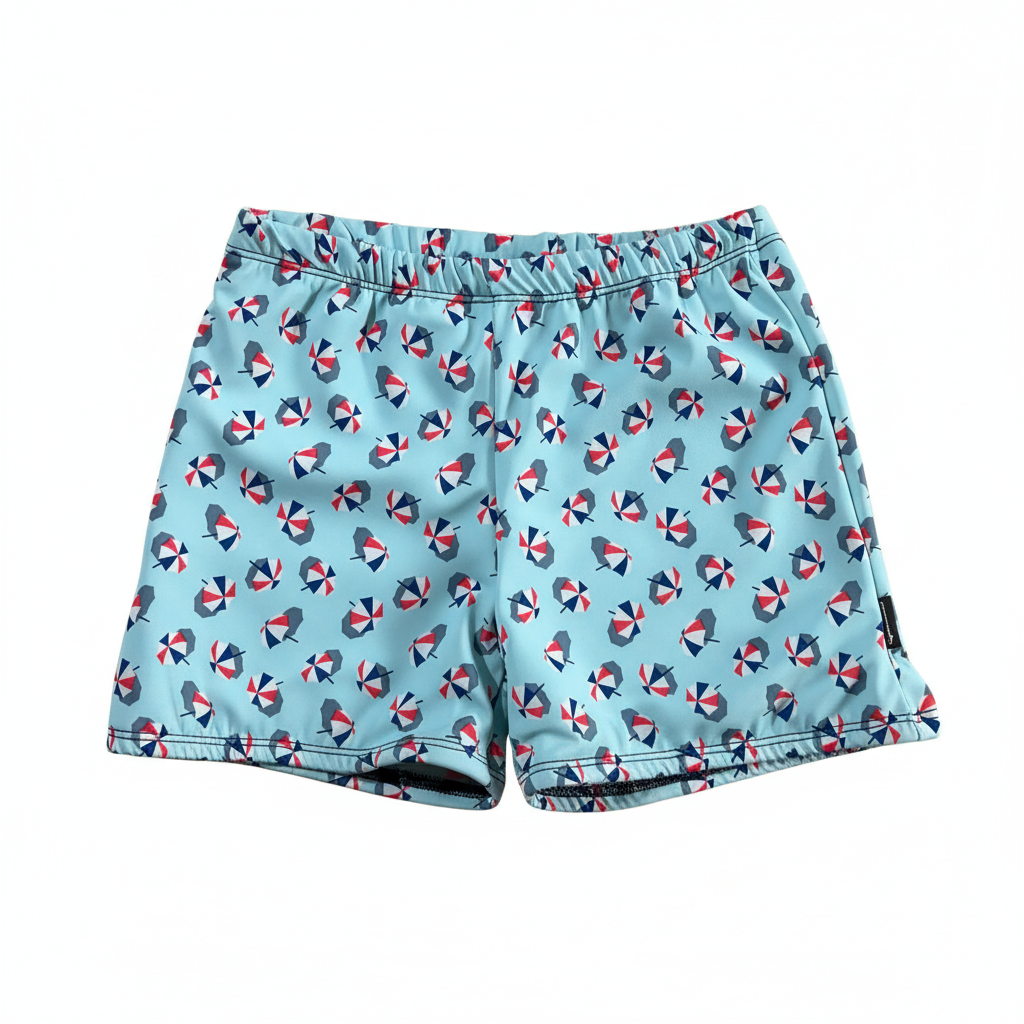 Light blue beach umbrella print swim shorts on white background
