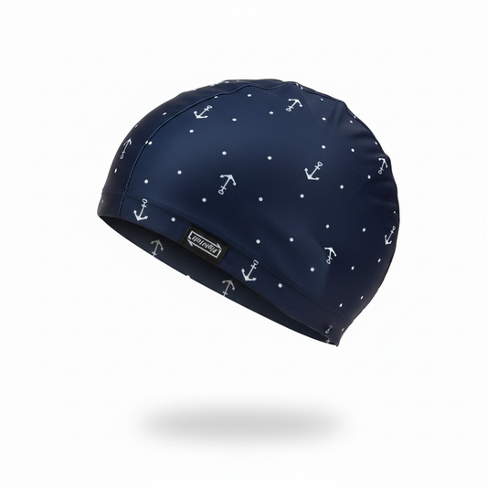 Navy blue anchor patterned lycra cap - left side floating view with brand name