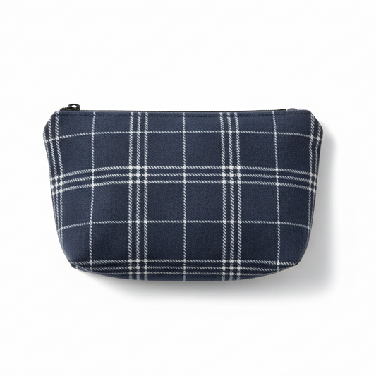 Navy blue and white plaid clutch pouch on white background