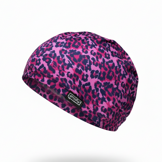 Pink and navy leopard print lycra cap - left side floating view with brand name