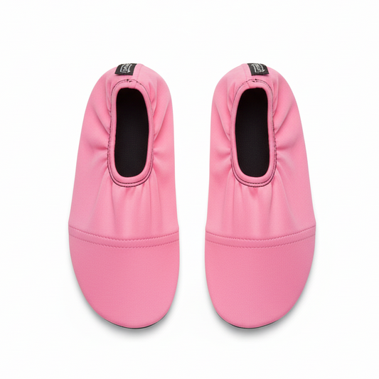 Pink water shoes on white background