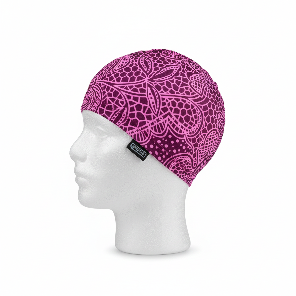 Purple paisley patterned lycra cap on mannequin - left side view