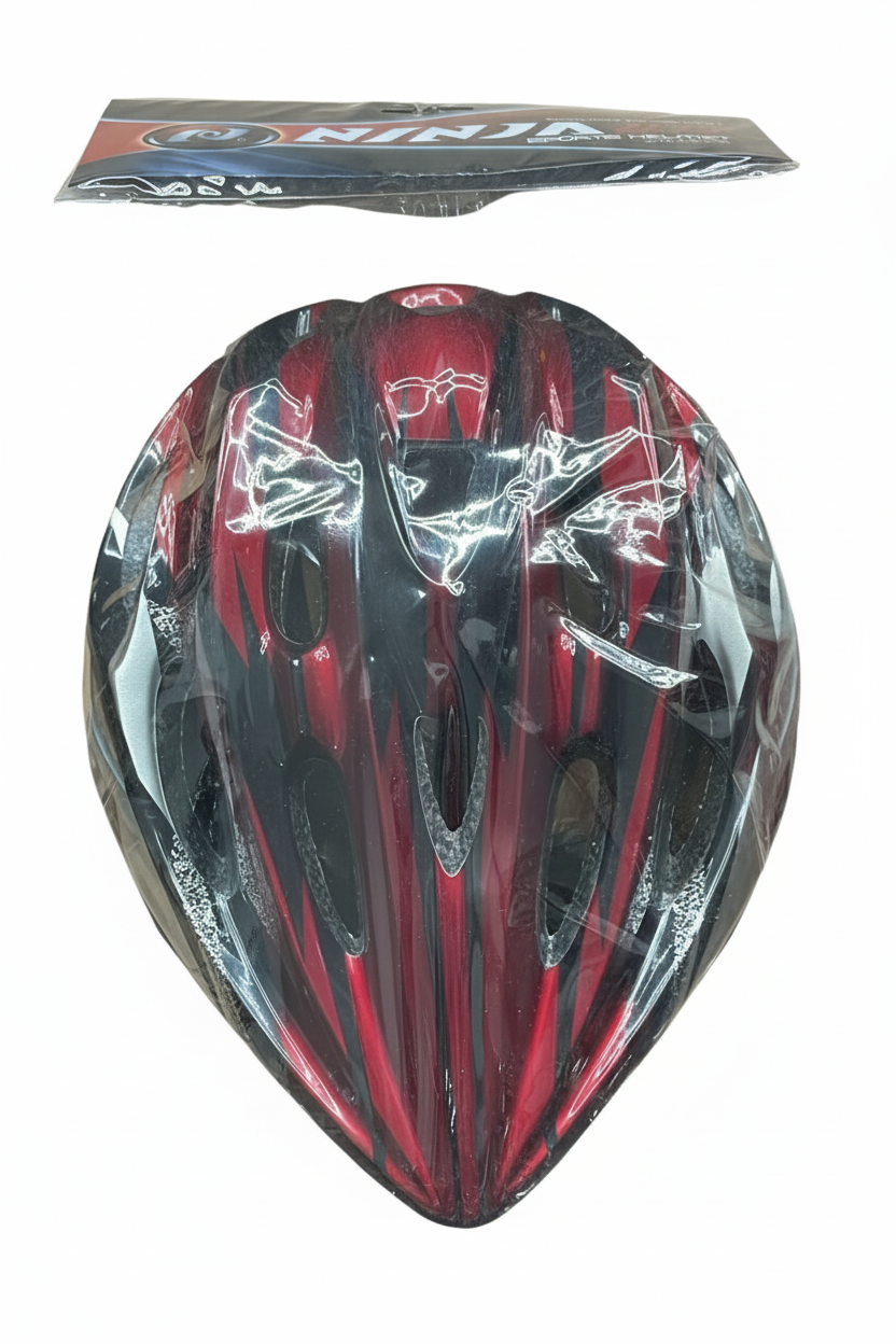 Red and black Ninja helmet with packaging on white background