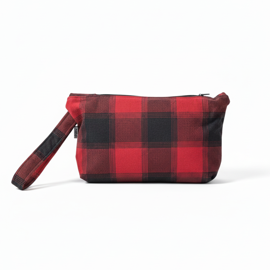 Red and charcoal gray buffalo plaid wristlet clutch on white background