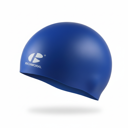 Royal blue RICHMORAL swim cap floating - left side view