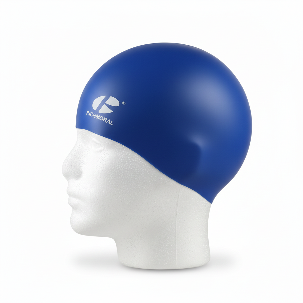 Royal blue RICHMORAL swim cap on mannequin - left side view
