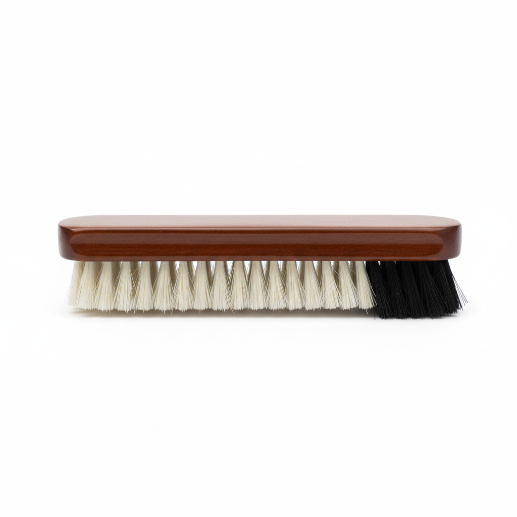 Square product image of dual-bristle shoe brush on white background