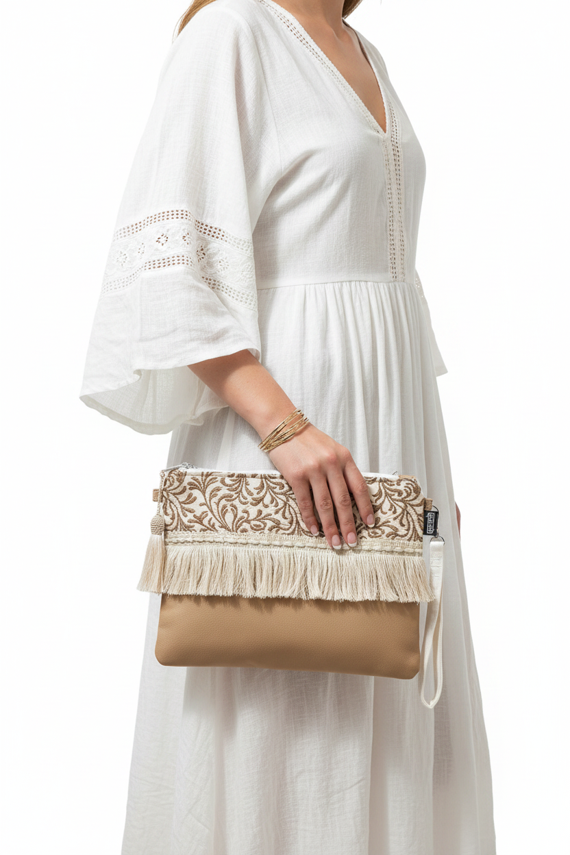 Woman holding boho clutch